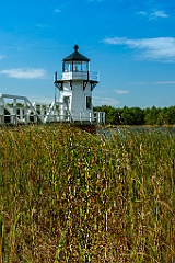 Doubling Point Lighthouse Over Marsh Grass in Maine
